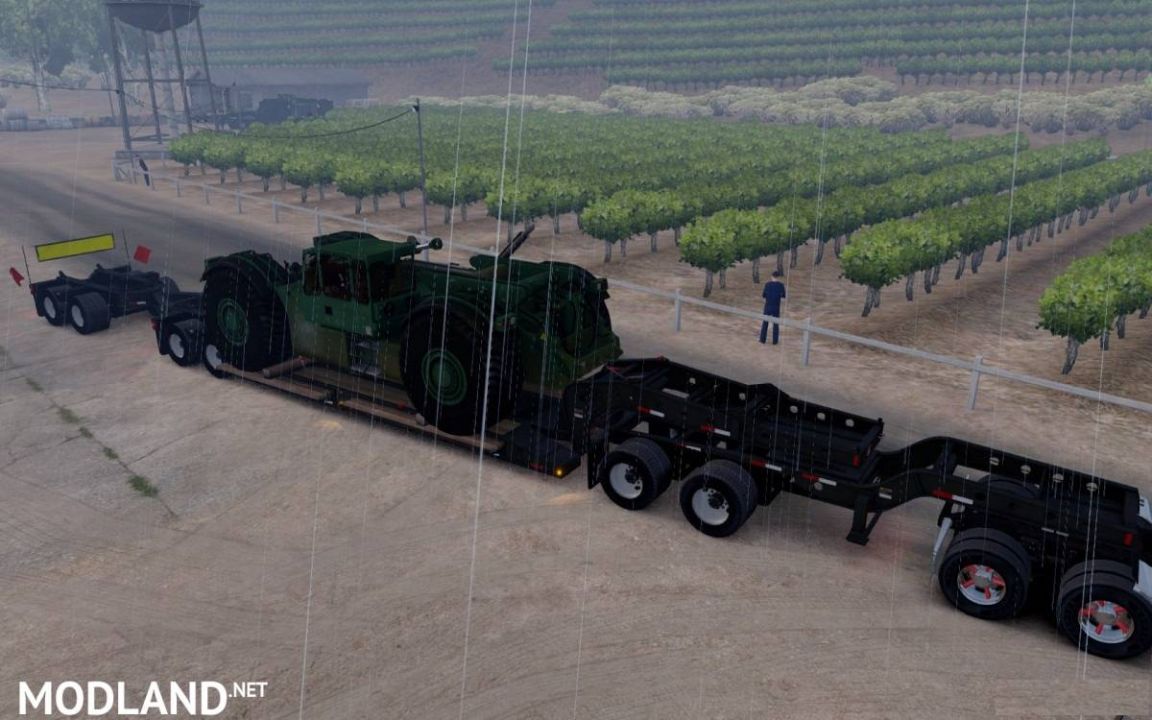 Long Oversized Trailer Magnitude 55l with a Load Chassis Reach Stacker