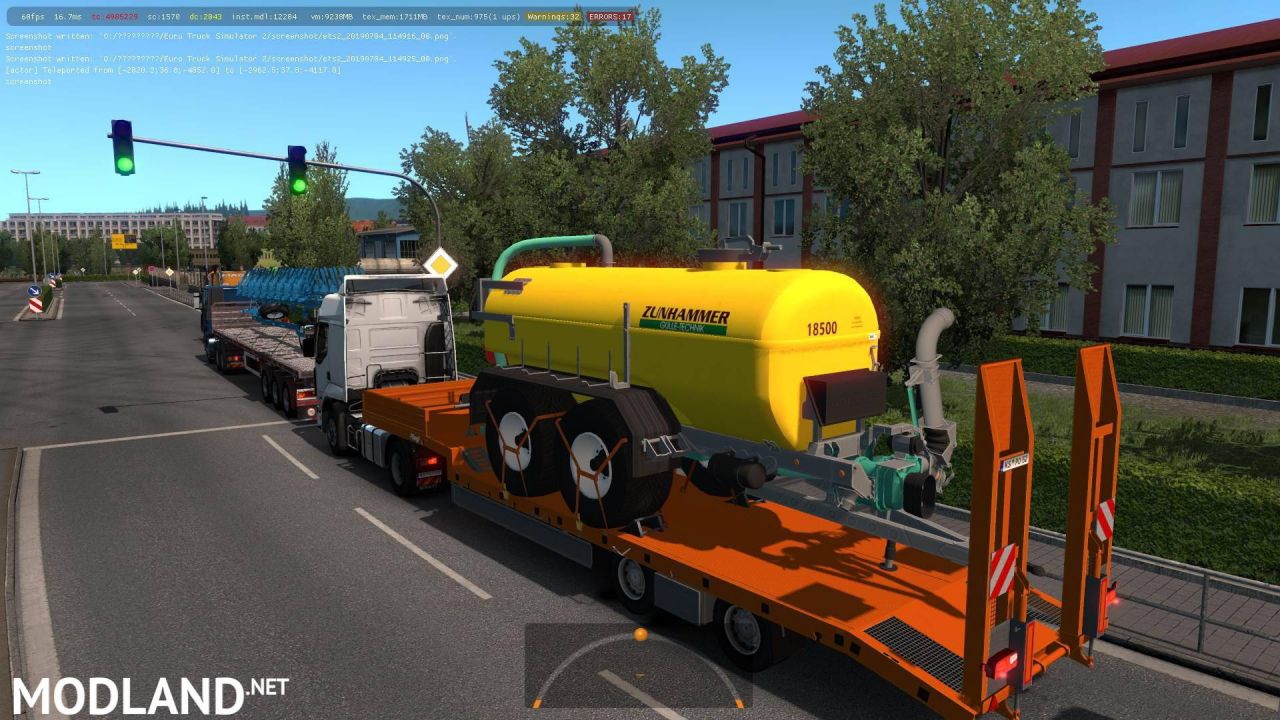 Agricultural trailers pack in traffic 1.35
